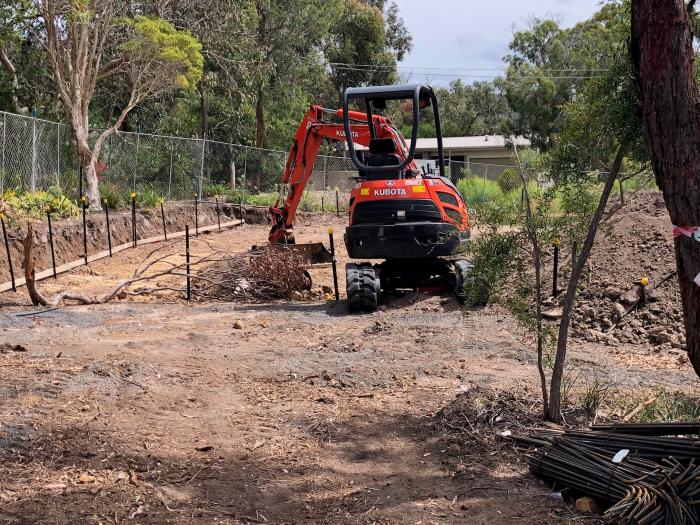 Image of excavator starting on site